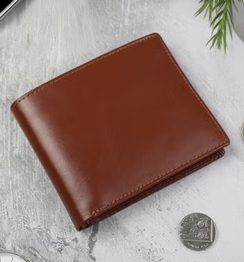 image111.png Keep your valubles safe in this Finnan ripper wallet. Secured with hook and loop tape, this handy pocket wallet has plenty of space for cash, cards and a zipped pocket for your spare change.
• Hook and loop tape fastening
• Note compartment
• Card slip pockets
• Zipped coin pocket - Image 1