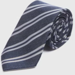 This plain grey textured polyester tie from Taylor & Wright is perfect for the office and formal occasions alike. Dimensions: Blade Width: 7.5cm. Length: 148cm.
