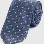 Crafted from smooth, durable fabric, it’s easy to tie and comfortable to wear – ideal for everything from office days to evening events.

Key Features:

Contemporary geometric pattern
Versatile navy colour
Smooth and durable fabric
Great for business, weddings, or smart-casual wear