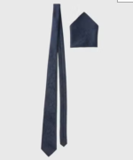 This plain red textured polyester tie from Taylor & Wright is perfect for the office and formal occasions alike. Dimensions: Blade Width: 7.5cm. Length: 148cm.