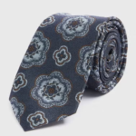 Add a touch of timeless charm to your formal wardrobe with the Taylor & Wright 2 Pack Polka Dot Texture Ties. Designed for effortless sophistication, this set features two sleek ties with subtle textured detailing and classic polka dot patterns. Perfect for weddings, work events, or elevating your everyday suit, these ties bring a refined finish to any look. Crafted from high-quality fabric, they offer a luxurious feel and a polished drape.

1x Sage colour with texture pattern
1x Cream with polka dot pattern
2 Pack
Taylor & Wright