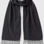 Wrap yourself in timeless style with this Navy Check Scarf. Featuring a classic check pattern in warm brown tones, it’s the perfect accessory to elevate any outfit. Soft, cozy, and versatile, this scarf adds both comfort and sophistication whether you’re dressing up for a crisp autumn walk, a winter outing, or simply layering for everyday wear. A wardrobe essential that never goes out of style.

Navy
Scarf
Check